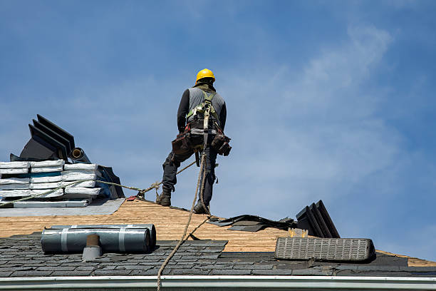 Professional Roof Replacement technician working in Little Compton, RI